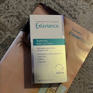 Exuviance Brightening Bionic Eye Creme - Silver and Blue